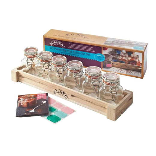 Especias y condimentos para cocinar en una caja de madera.